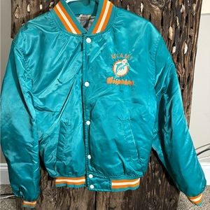 Vintage Miami Dolphins NFL jacket. Adult size small. In used vintage condition.